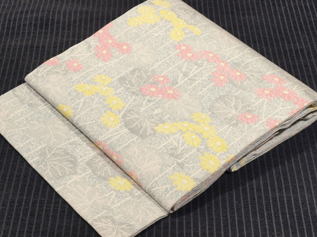 石蕗（つわぶき）文様 型染め 名古屋帯