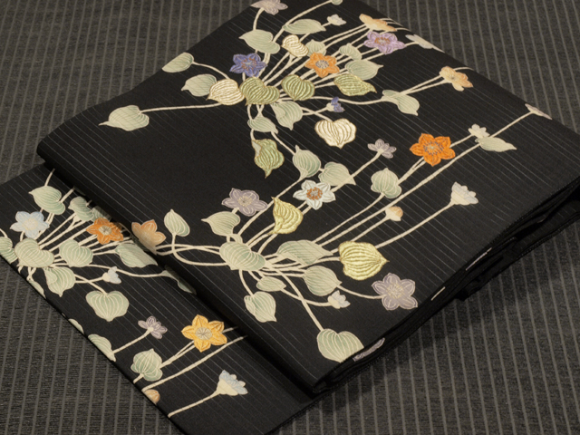 草花文様 型染めに手刺繍 絽塩瀬 名古屋帯